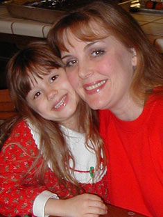 Lisa with our daughter Camille, who was the first to catch head lice